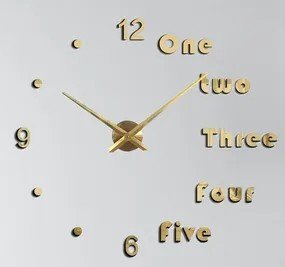 Reloj de pared 3D dorado con letras y números